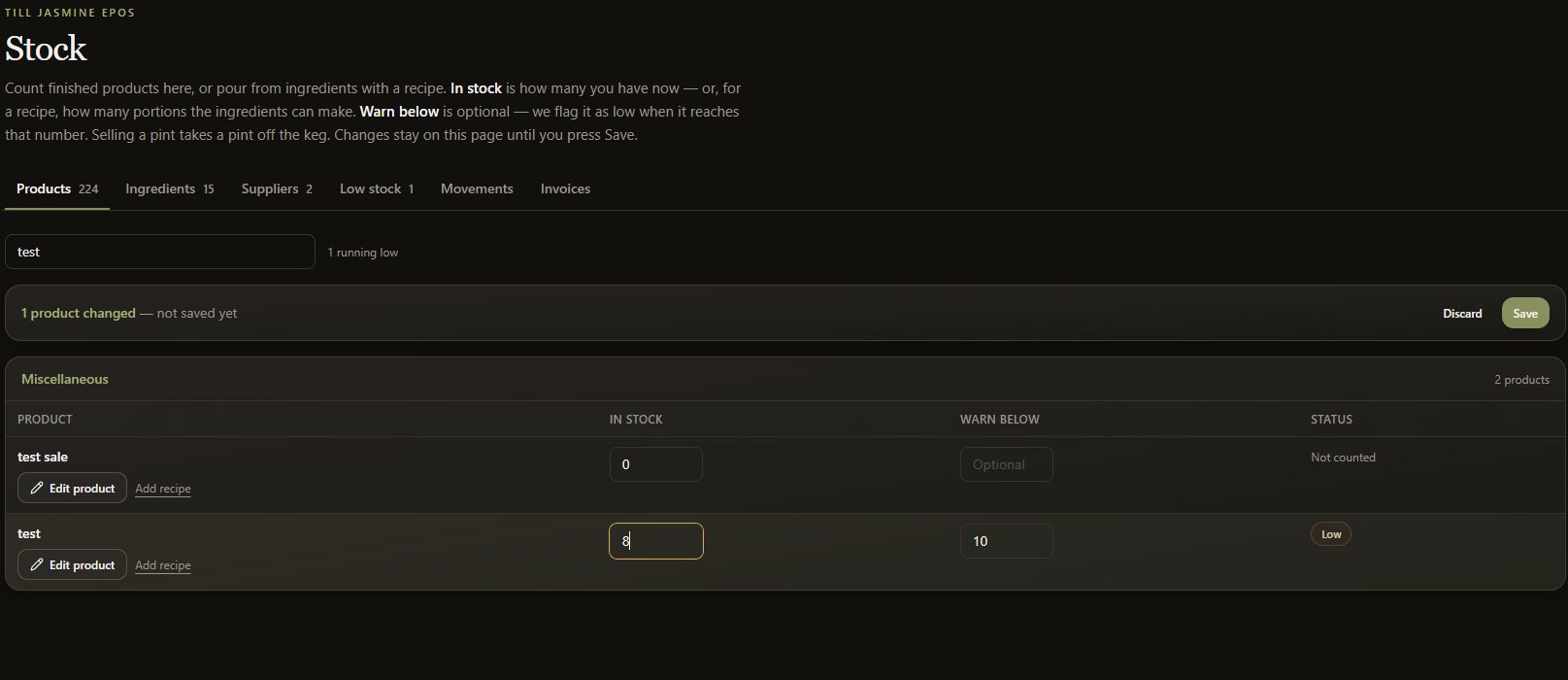 Dark-mode Stock screen showing Low status for the illustrative count of eight against a threshold of ten